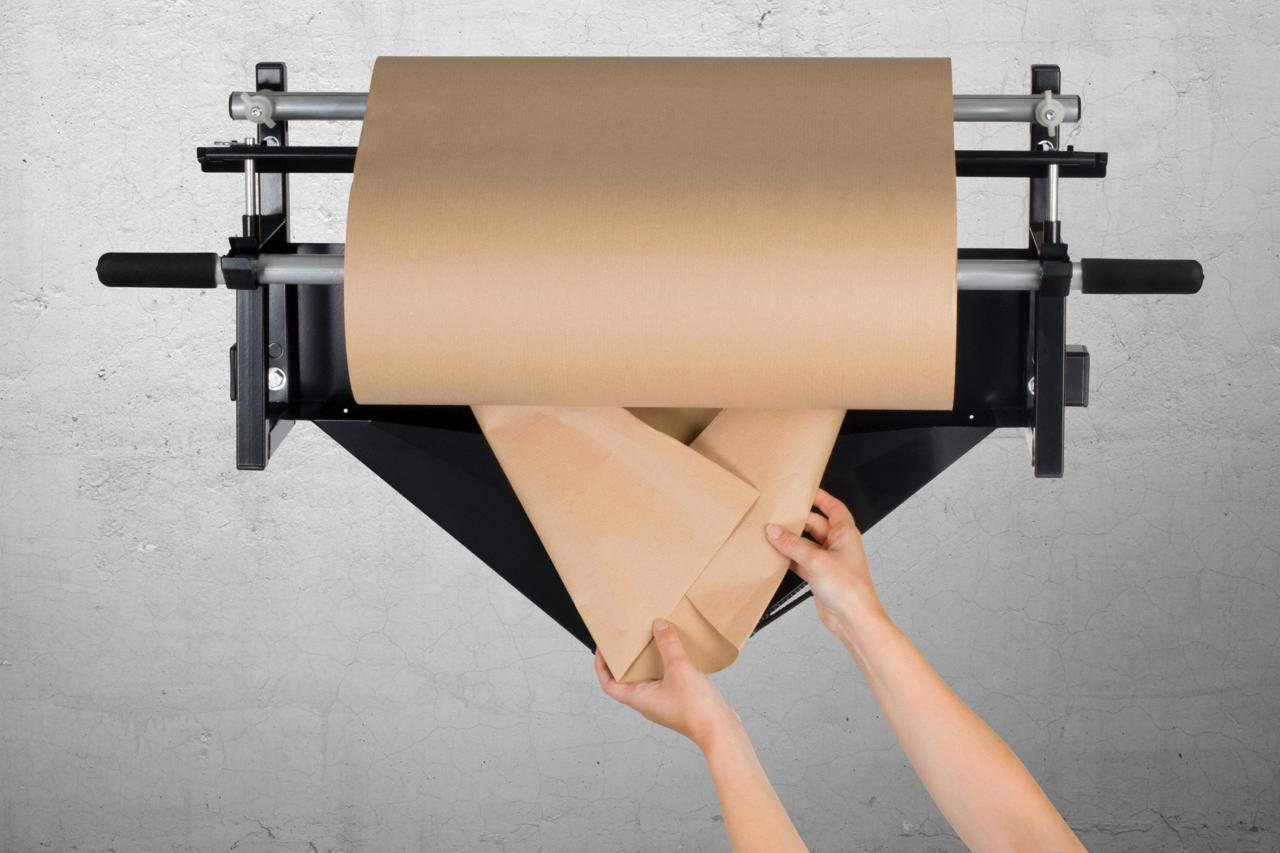 Pour l’insertion, plier le papier et l’insérer...