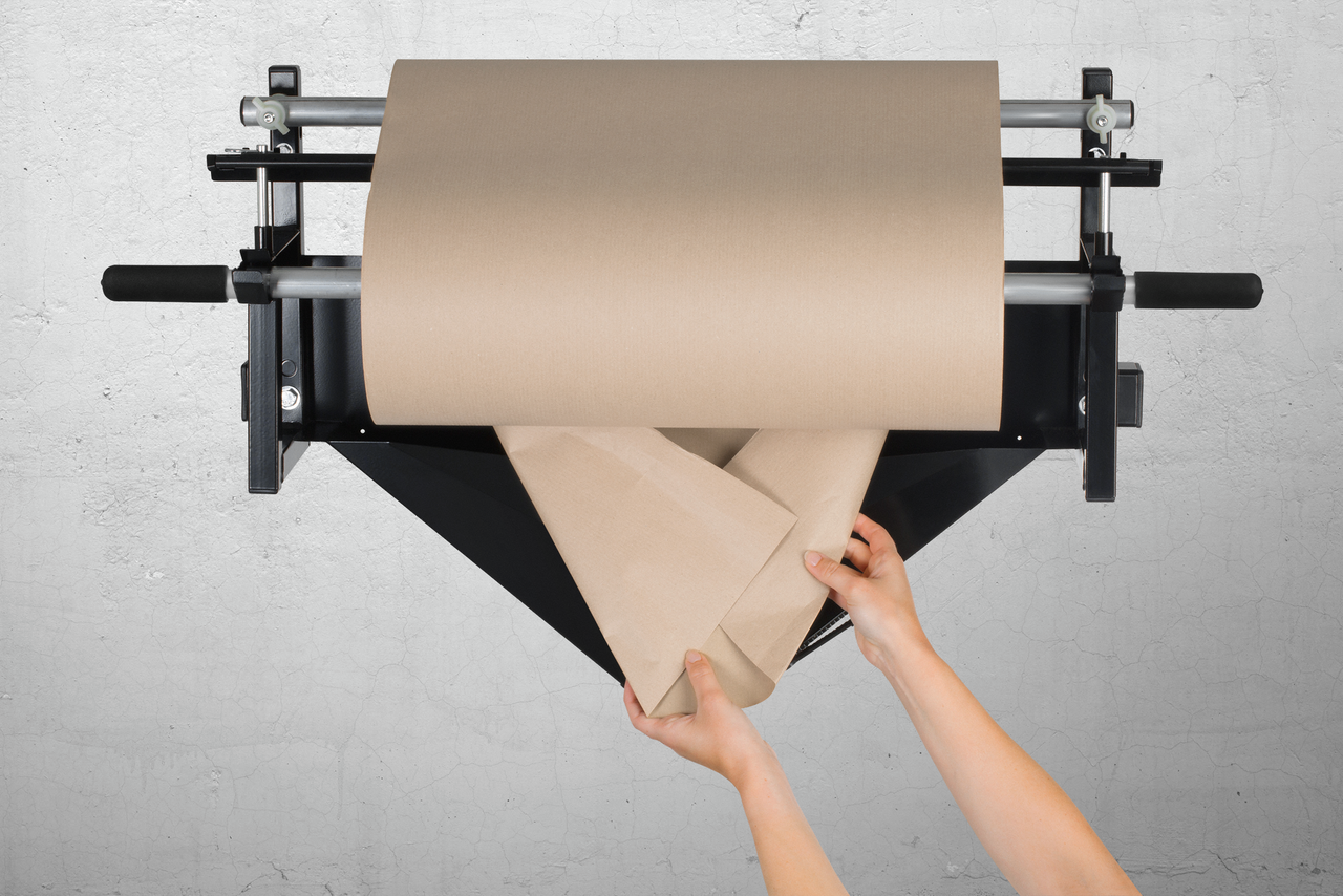Manipulation facile: pliez le papier et insérez-le dans le dérouleur.