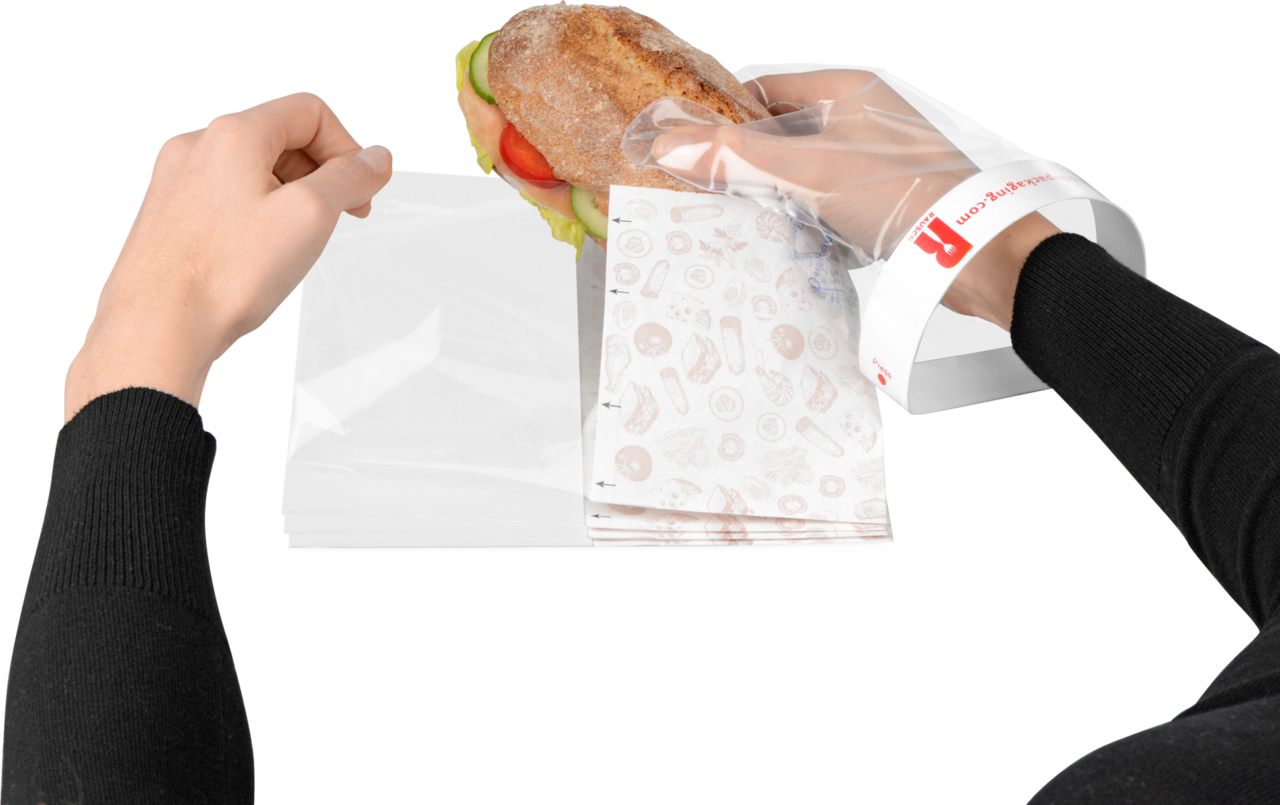 Emballé en un tour de main! Placez le sandwich sur le papier du Snack-Bag, ...