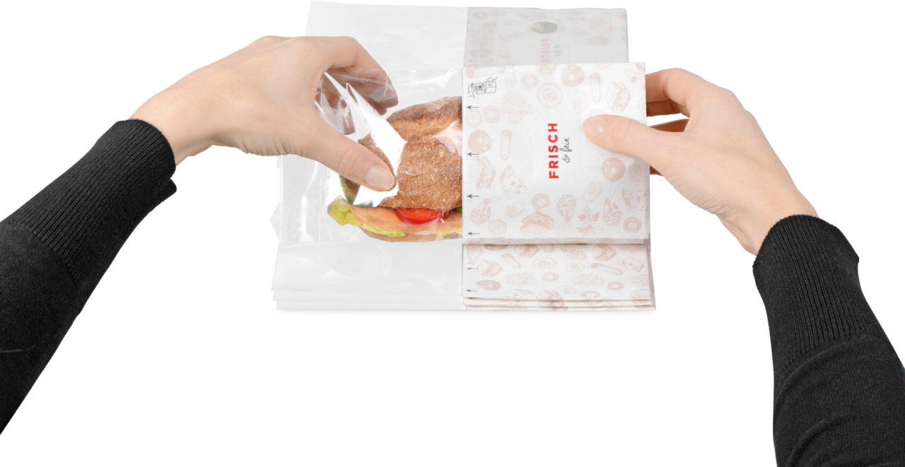... enroulez et fermez le sachet avec le point adhésif.