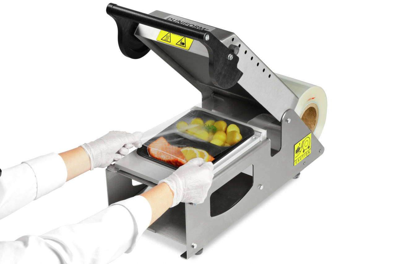 Scelleuse pour barquettes à menu