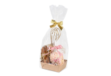 joliment décorés d'un nœud et d'un pot de produits fins en carton brun 