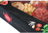 La boîte traiteur noire, avec son look ardoise élégant, est imprimée avec différents aliments.