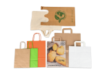 Vielfältiges Musterpaket an Tragetaschen – entdecken Sie verschiedene Materialien, Grössen und Designs von Papier- und Stofftaschen für jeden Bedarf.