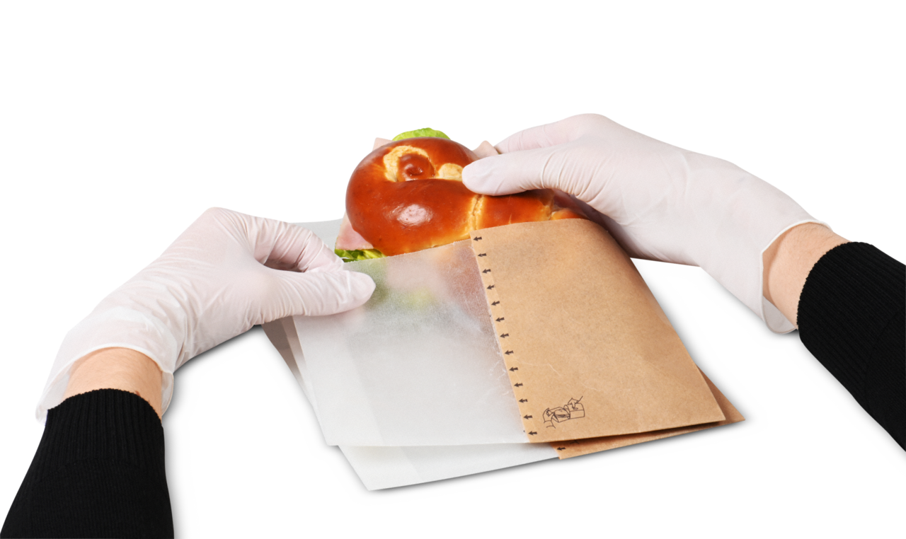 Im Handumdrehen verpackt! Sandwich auf das Snack-Blatt legen, …