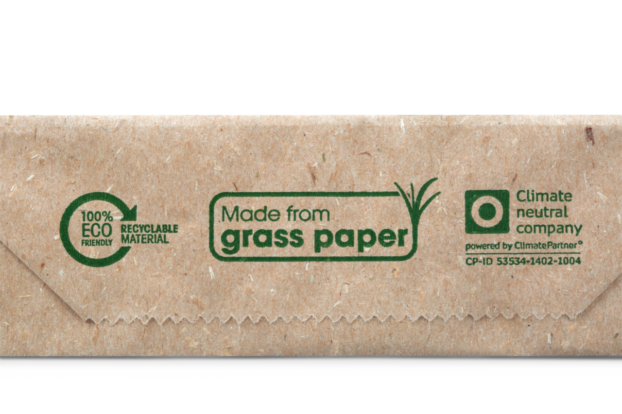 Aufdruck weist auf nachhaltiges Graspapier-Material hin